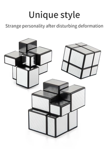 Macro view of silver brushed mirror puzzle cube showing distorted shapes and metallic texture
