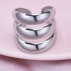 Macro detail of triple-layered 304 stainless steel ring with polished silver finish