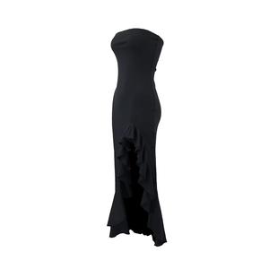 Detail of black strapless evening dress featuring ruffled edges and a high side slit hem