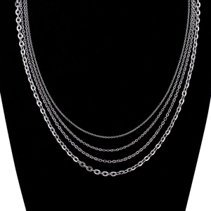 Multi-layered silver stainless steel necklaces featuring curb and ball chain styles