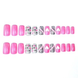 Medium square press-on nails set featuring glitter pink and XOXO heart designs