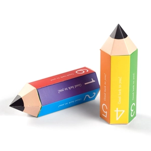 Detail of colorful pencil shaped gift boxes with Good luck to you printing