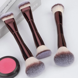 Dual-ended makeup brush set with foundation and powder heads in metallic finish