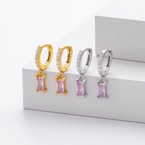 Close-up of S925 silver hoop earrings with zircon and pink rectangular gemstones