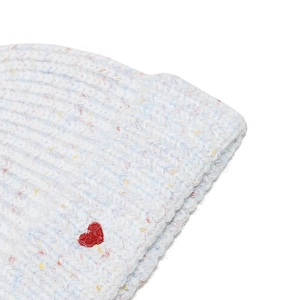 Detail shot of white mixed knit beanie with red heart embroidery and colorful flecks