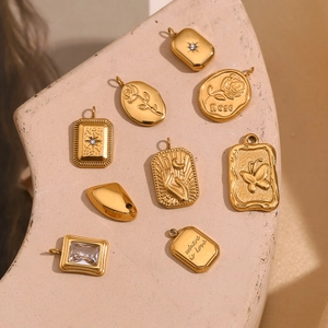 Vintage 18K gold plated stainless steel pendants with rose and celestial motifs
