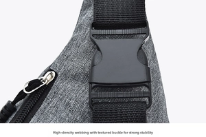 Detail of durable grey fabric with high-density nylon strap and plastic buckle closure