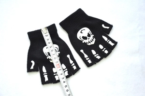 Detailed view of black fingerless skeleton gloves with size measurements in centimeters