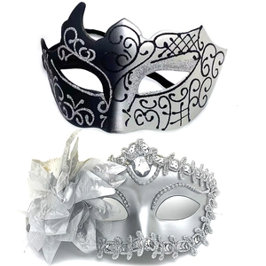Elegant pair of black and silver masquerade masks with glitter patterns and floral accents