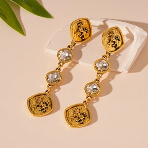Boucles d'oreilles pendantes lion doré vintage avec pampilles en cristal octogonal chic