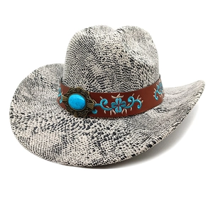 Detail of snake print cowboy hat with turquoise stone and blue floral leather band