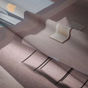 Detailed macro view of soft brushed texture and modern geometric patterns on bohemian tapestry