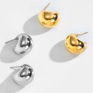 Pendientes de aro gruesos de media luna en acero de titanio oro de 18K y plata pulida