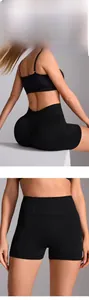 Detailed view of high-waist ribbed yoga shorts with seamless lifting and shaping texture