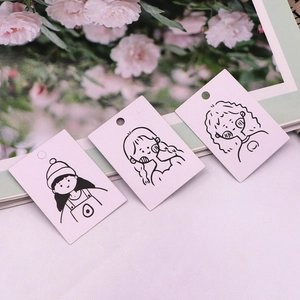 Minimalist white paper earring display cards featuring cute cartoon girl illustrations