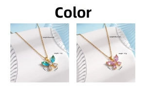 Close-up of butterfly zircon pendant necklaces in blue and pink color options