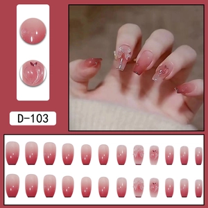 Press-on nails featuring red gradient finish with 3D bows and heart accents