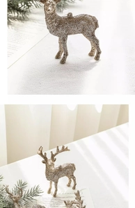 Detailed view of glittery Christmas reindeer ornaments with elegant bows and antlers