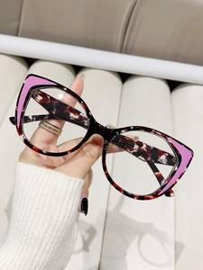 Cat-eye glasses detail with tortoiseshell frame and pink-purple corner decoration