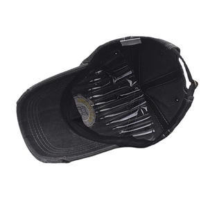 Detail showing inner structure of washed cotton baseball cap with B logo embroidery