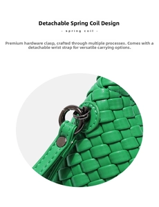 Detail of green woven leather bag featuring intrecciato craft and spring coil hardware