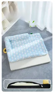 Detail view of the removable sponge core and hidden zipper on the blue cooling pet bed