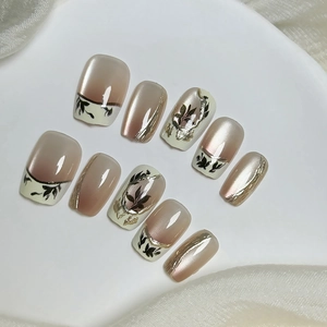 Exquisite handmade cat-eye press-on nails featuring bamboo leaf art and French style.