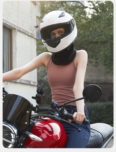 Detail of black ice silk neck gaiter worn with a motorcycle helmet for sun protection