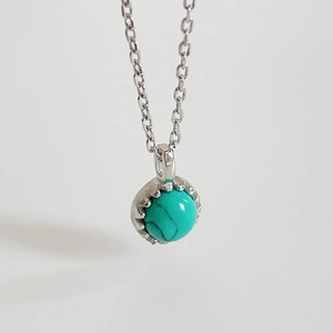 Minimalist S925 silver necklace featuring a round turquoise pendant with natural veins
