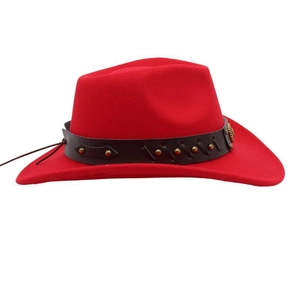 Detail of red cowboy hat featuring leather band with gold rivets and vintage buckle