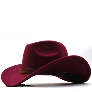 Classic wine red western cowboy felt hat with brown leather belt trim on white background