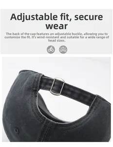 Detail of adjustable metal buckle on washed charcoal grey cotton baseball cap