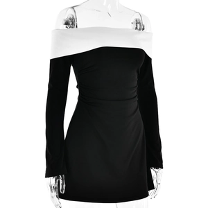 Detail of slim-fit off-shoulder mini dress with black and white color block design