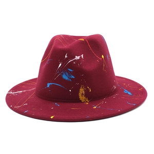 Burgundy felt fedora hat featuring artistic colorful paint splatter graffiti design
