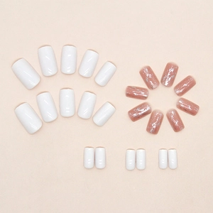 Square pearlescent press-on nails in white and mauve with elegant silver foil accents