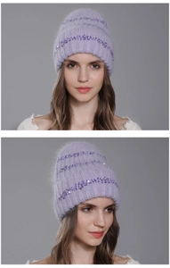 Detailed knit texture of light purple beanie with shimmering sequins and soft faux fur