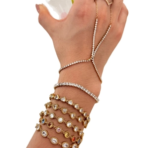 Gold multi-color gemstone bracelet set with heart zircon hand chain on model wrist