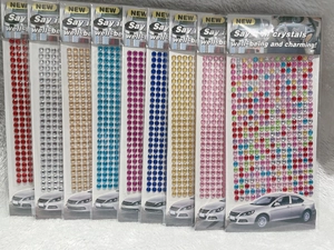 Close-up of 3mm self-adhesive acrylic rhinestone stickers in multiple vibrant colors