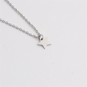 Polished silver stainless steel star pendant necklace on a clean white background