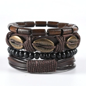 Handmade multilayer leather bracelet set with wooden beads and a metallic shell charm