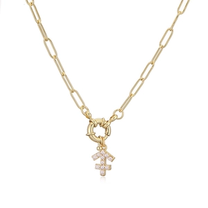 Elegant gold Sagittarius pendant necklace with inlaid pearls on a paperclip chain link