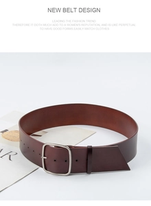 Detail of vintage reddish-brown leather belt with a square silver metal buckle on top