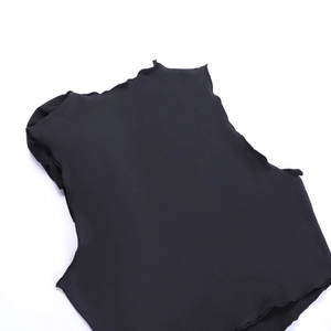 Detailed view of the black elastic fabric featuring delicate ruffled wavy edges and stitching