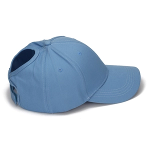 Detail view of cotton ponytail baseball cap in light blue with rear high bun opening