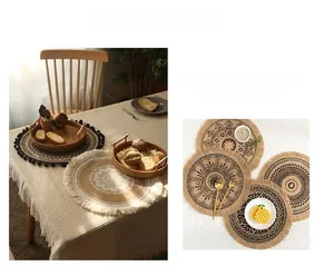 Detail of bohemian round jute placemat with mandala print and elegant tassel fringe
