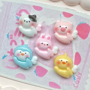 Detailed view of 5 cute resin cartoon animals with wings for DIY crafts and decor