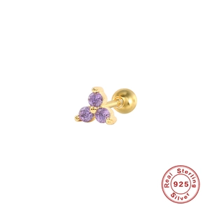 Macro detail of S925 sterling silver triangle stud earring with purple zircon stones
