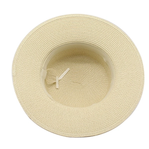 Detailed top view of a French vintage straw hat featuring adjustable inner sweatband