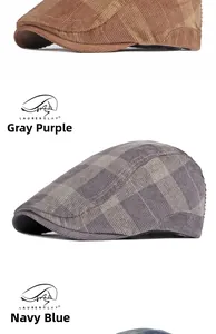 Detailed close-up of corduroy texture on grey-purple and navy blue plaid beret caps