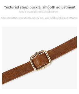 Detail of adjustable brown litchi grain leather strap with gold buckle for tote bags
